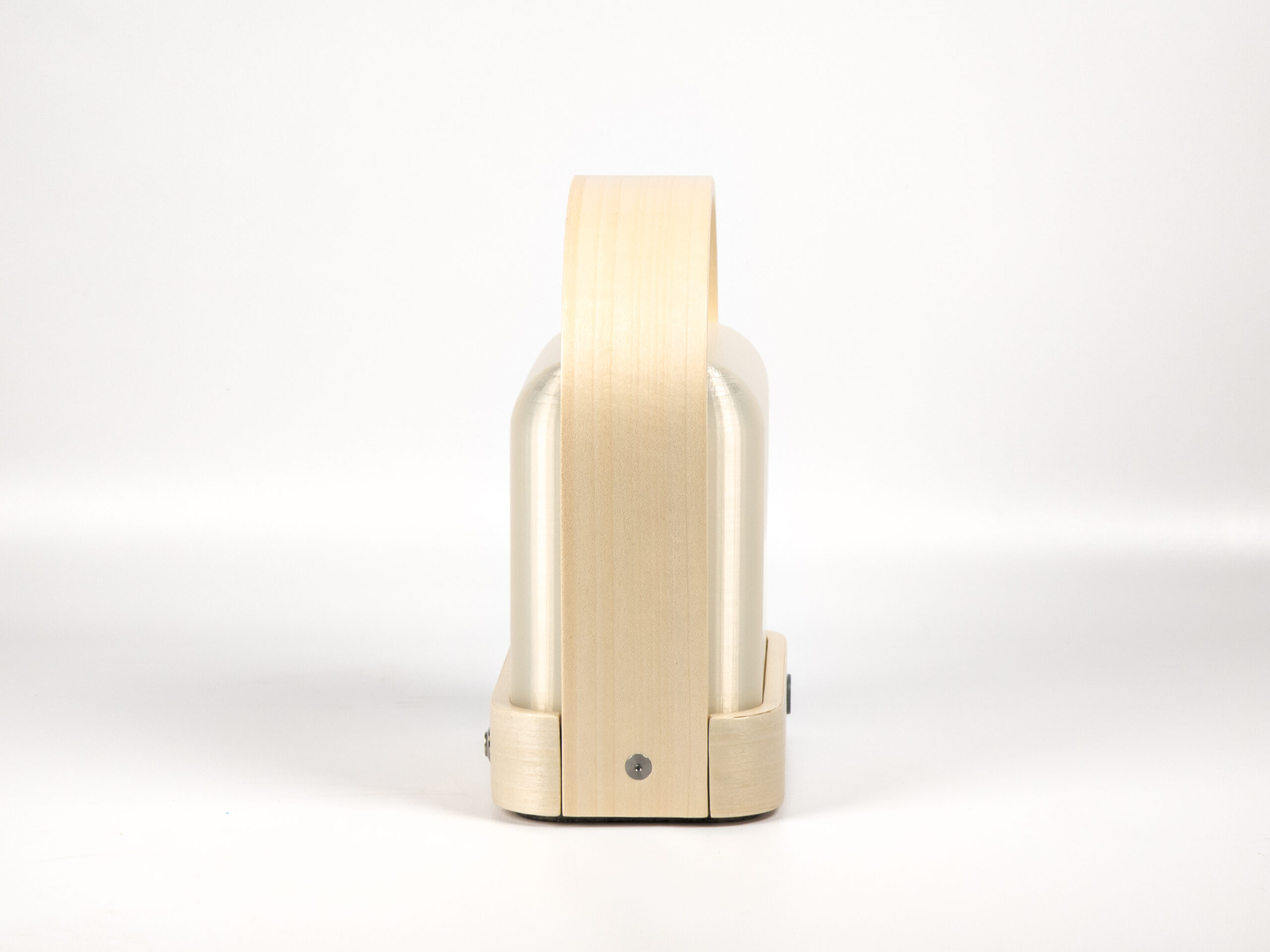 Front view of wood and plastic lantern with curved handle against a white background with handle fastening screw visible